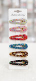 Pack of 6 Glitter Star & Floral Snap Hair Clips